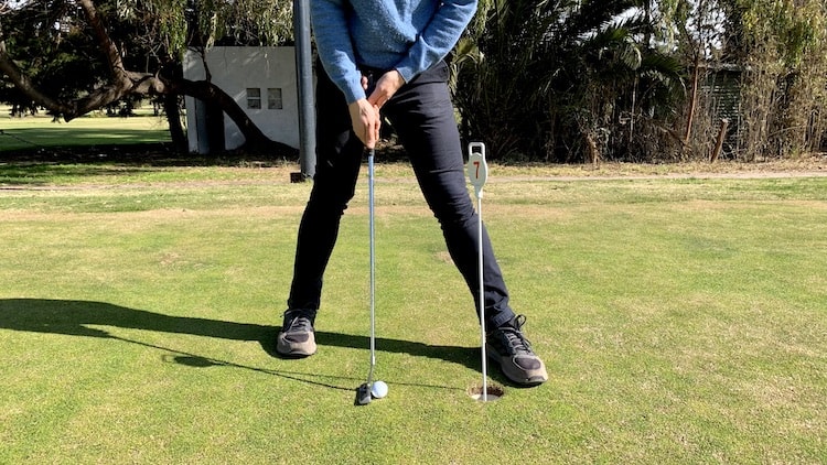 What is Standing Astride in Golf?